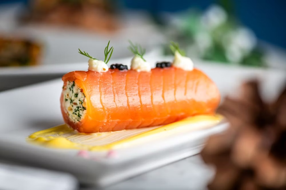 An image of a stuffed roll of smoked salmon at FishWorks